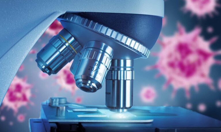 Compound microscope in a microbiology laboratory representing bacterial research